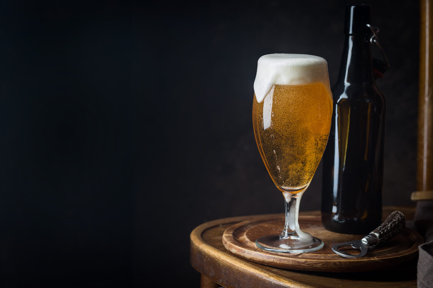 Glass beer on dark background