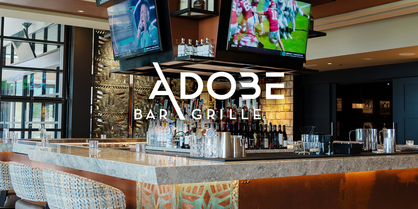 Adobe Grill bar overlooking golf courses and city lights views